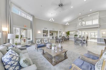 Spacious resident lounge with sitting area  at manor at victoria park, temple hills, md